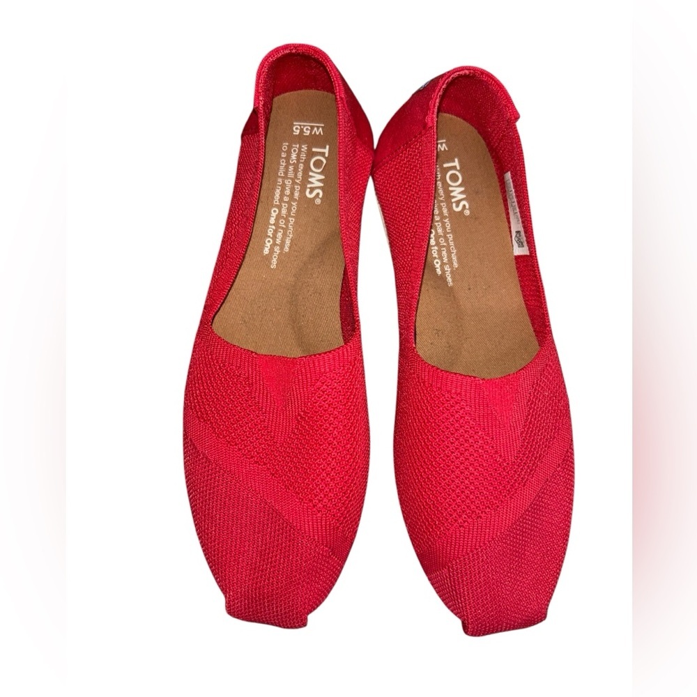 Euc women’s Toms Slide on shoe